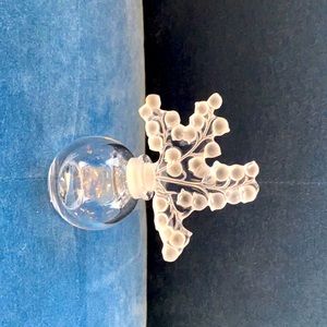 Lalique perfume bottle. Stamped and authentic.